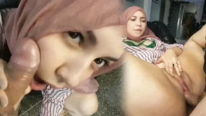 Cherry in pink hijab getting fucked on the couch with her legs spread wide - MyPornerLeak
